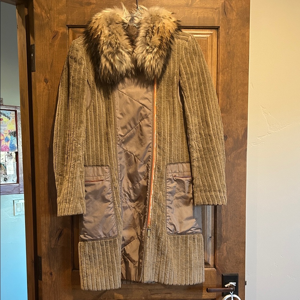 Carolina Herrera knee length coat with fur collar.